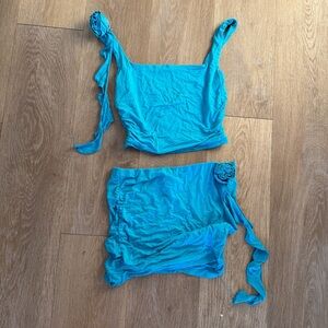 Blue Two-Piece Set with Tie Straps and Rose Detail